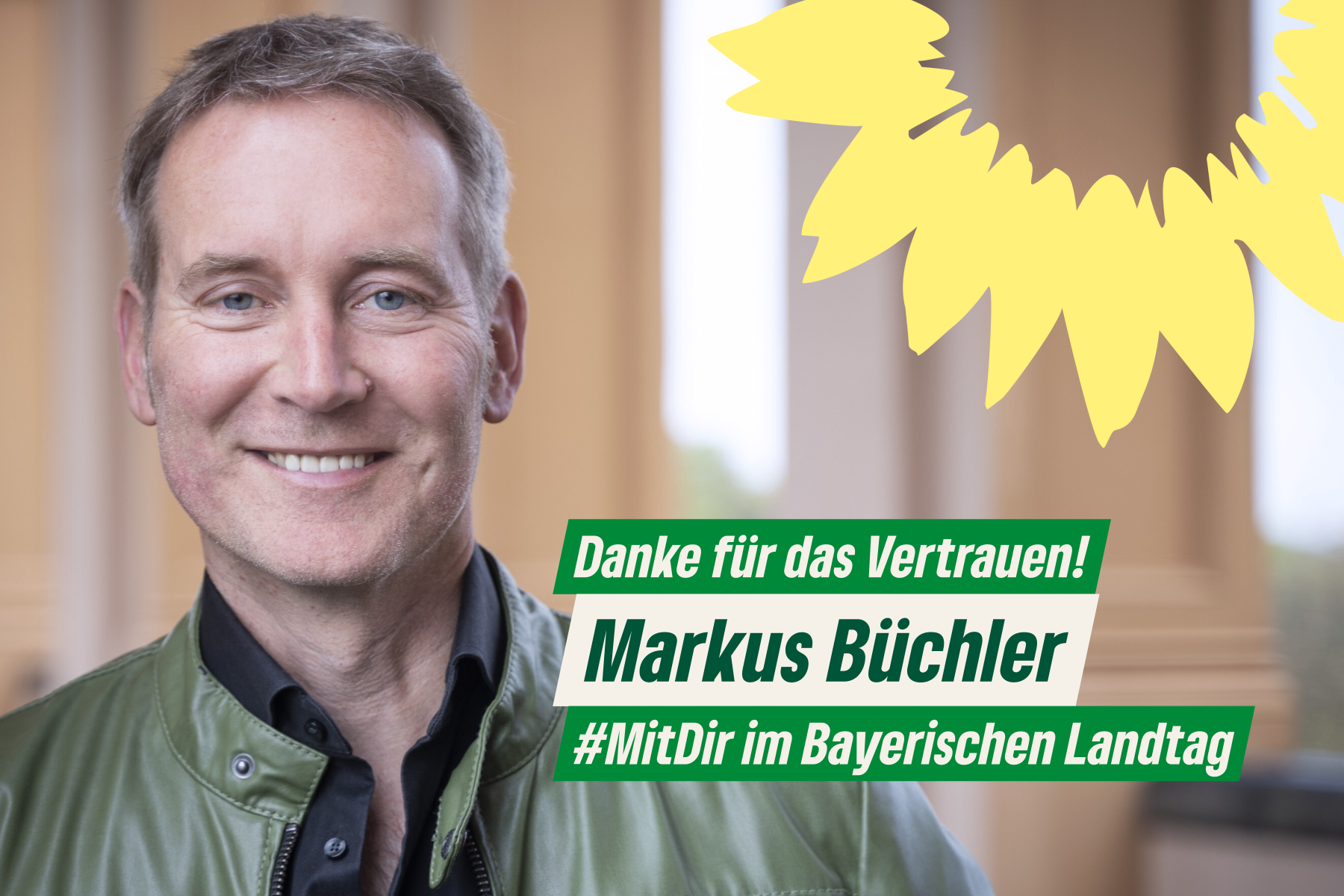 Portrait Markus Büchler mit freudigem Gesichtsausdruck auf den Landtagsarkaden und Schriftzug: "Danke für das Vertrauen! Markus Büchler #MitDir im Bayerischen Landtag"